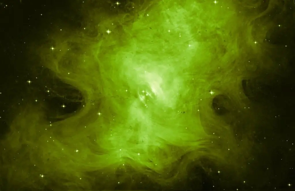   In 1054 AD, during the Song dynasty, Chinese astronomers spotted a bright new star in the night sky. This newcomer turned out to be a violent explosion within the Milky Way, caused by the spectacular death of a star some 1600 light-years away. This explosion created one of the most well-studied and beautiful objects in the night sky — the Crab Nebula. The beautiful result of this cataclysmic Type II supernova is shown here, imaged by the NASA/ESA Hubble Space Telescope’s Advanced Camera for Surveys. Unlike more commonly seen views of this remnant (heic0515), which show incredibly intricate branches and spires laced throughout the region, this image uses just a single filter, giving rise to a smoother and far simpler view of the famous nebula. The unstoppable collapse of the Crab’s progenitor star led to the formation of a rapidly rotating neutron star named the Crab Pulsar, which lurks at the heart of the nebula. This object is roughly the same size as Mars’ small moon Phobos, but contains almost one and a half times the mass of the Sun, and whirls around thirty times every second. This causes jets of high-energy radiation to periodically sweep in the direction of Earth, like the spinning beams of a lighthouse, causing the Crab Nebula to appear to pulse at specific wavelengths. The Crab Nebula is also known as NGC 1952 and Messier 1. The second of these names was assigned by Charles Messier. He initially misclassified the nebula with Halley’s Comet but soon he realised that the object did not move. Hence he decided to call it M1 as the first object of a catalogue of objects that look like comets but are not.