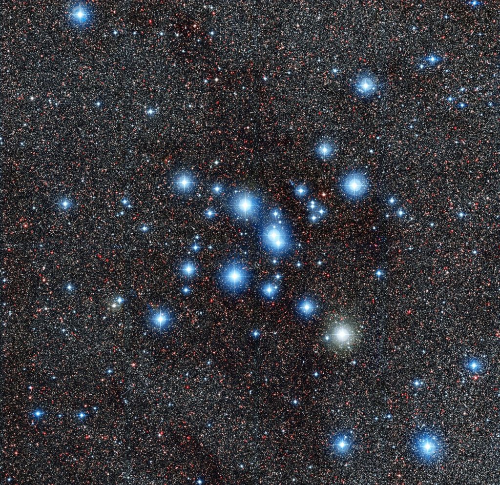 This new image from the Wide Field Imager on the MPG/ESO 2.2-metre telescope at ESO’s La Silla Observatory in Chile, shows the bright star cluster Messier 7, also known as NGC 6475. Easily spotted by the naked eye in the direction of the tail of the constellation of Scorpius (The Scorpion), this cluster is one of the most prominent open clusters of stars in the sky and an important research target.