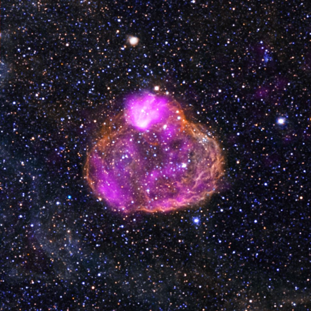 DEM L50 (a.k.a. N186) is what astronomers call a superbubble. These objects are found in regions where massive stars have formed, raced through their evolution, and exploded as supernovas. The winds and shock waves from the supernovas carve out huge cavities in the gas and dust around them, creating superbubbles. This composite contains X-rays from Chandra (pink) and optical data from ground-based telescopes (red, green, and blue). The superbubble in DEM L50 is giving off about 20 times more X-rays than expected by standard models. Researchers think supernova shock waves striking the walls of the cavities and hot material evaporating from the cavity walls may be responsible for this additional X-ray emission.